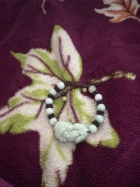 Pale Green Jade Bracelet with Carved Pendant
